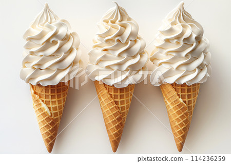 A single scoop of vanilla ice cream on a waffle cone. 114236259