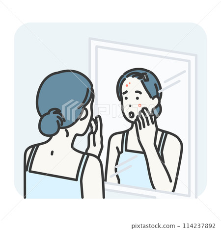 woman looking at pimple on her face in mirror woman looking at pimple on her face in mirror 114237892