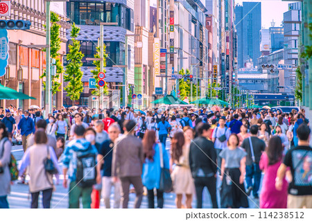 Tokyo cityscape, Japan Inbound tourism is back... Ginza pedestrian street crowded with foreign tourists during Golden Week = May 5th Tokyo cityscape, Japan Inbound tourism is back... Ginza pedestrian street crowded with foreign tourists during Golden Week = May 5th 114238512