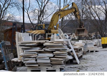 Stacked limestone slabs and tiles Stacked limestone slabs and tiles 114241591
