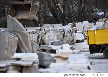 Stacked limestone slabs and tiles 114241593