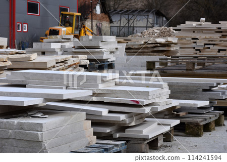 Stacked limestone slabs and tiles Stacked limestone slabs and tiles 114241594
