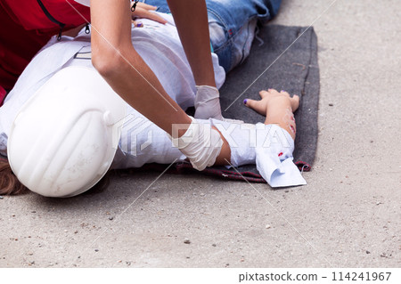 First aid after workplace accident 114241967