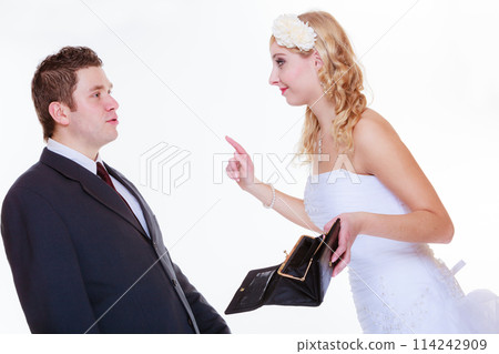 Groom and bride having quarrel argument 114242909
