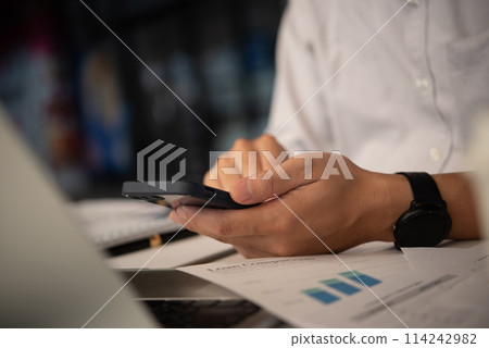 Online payment smartphone business man use phone with work at internet finance and banking at office. Online payment smartphone business man use phone with work at internet finance and banking at office. 114242982