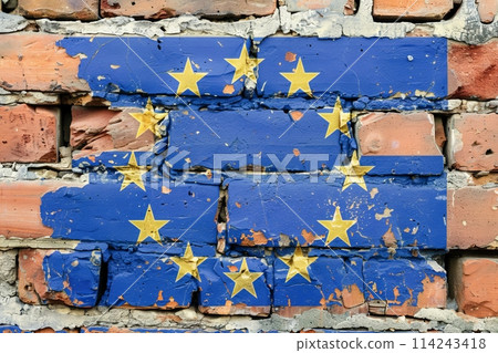 The EU flag stands out on an aging red brick backdrop, symbolizing unity amid decay. 114243418