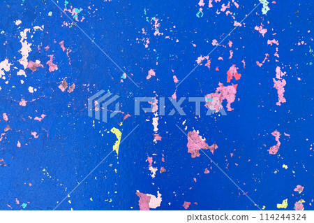Colorful peeling paint floor background, texture of a multicolor old wall 114244324