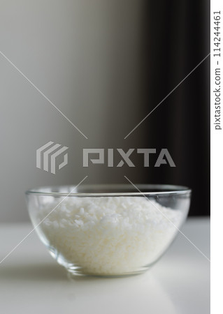 close-up of candle wax in granules on a light background close-up of candle wax in granules on a light background 114244461