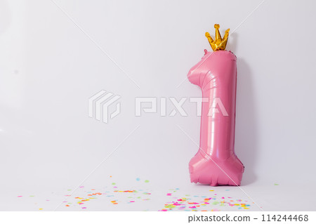 pink ball in the shape of a number one on a white background 114244468