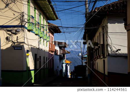 Beautiful streets at the historical downtown of the heritage town of Salamina located at the Caldas department in Colombia. Tangle of cables. Beautiful streets at the historical downtown of the heritage town of Salamina located at the Caldas department in Colombia. Tangle of cables. 114244561