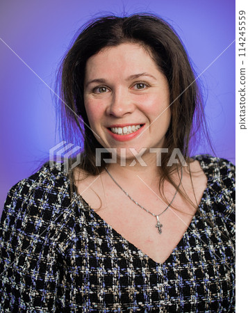 Portrait of young lovely pretty plus size cheerful positive woman wearing knitted dress isolated on purple color background - happy emotions and winning concept 114245559