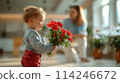 Adorable Toddler Surprising Mother with Bouquet of Red Flowers Indoors, ai-generated item 114246672