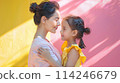 Tender Mother-Daughter Moment Against Colorful Background, ai-generated item 114246679