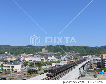 Kita-Osaka Kyuko 9000 series train running near Minoo-Senba-Handaimae Station 114248292
