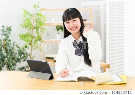 High school girl studying thumbs up 114253712
