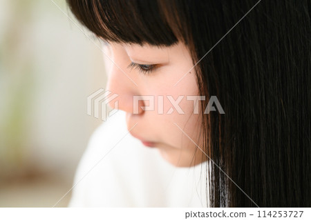 High school girl studying, worried 114253727