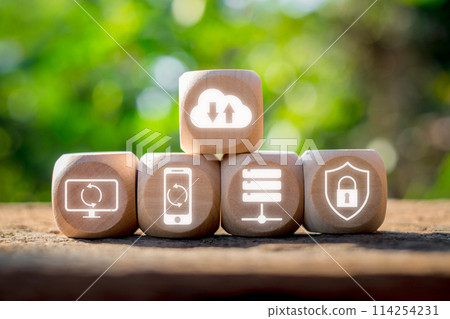 Backup concept, Wooden block on desk with backup icon on virtual screen. Backup concept, Wooden block on desk with backup icon on virtual screen. 114254231