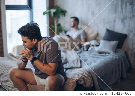 Young gay couple in quarrel at home. LGBT concept Young gay couple in quarrel at home. LGBT concept 114254663