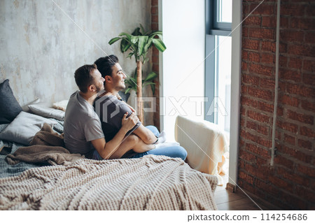 Gay couple at home, intimate moments of private life - Homosexual partners Gay couple at home, intimate moments of private life - Homosexual partners 114254686