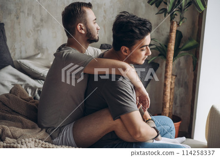 Two sexy caucasian gay guys hugging and having fun in bed indoors 114258337