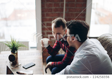 Homosexual partners working at office desk, relationships and business concept 114258356