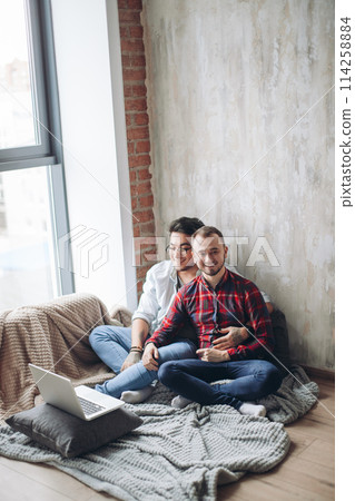 Homosexual partners working at office desk, relationships and business concept Homosexual partners working at office desk, relationships and business concept 114258884