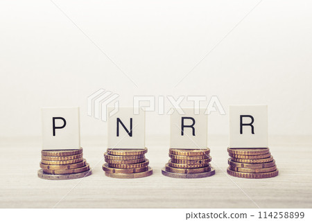 Stacks of coins with PNRR letters. UE economy concept. 114258899