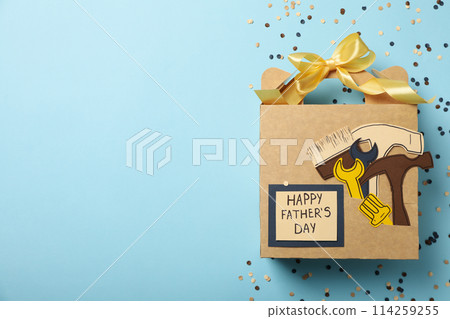 Gift for father, concept of world father's day, on blue background. 114259255