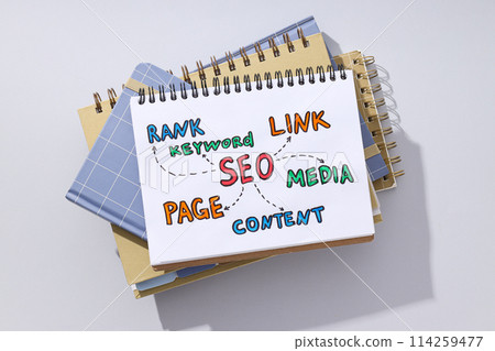 Notepads and diagram on light background, top view 114259477