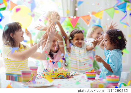 Kids birthday party. Children with cake and gifts Kids birthday party. Children with cake and gifts 114260285