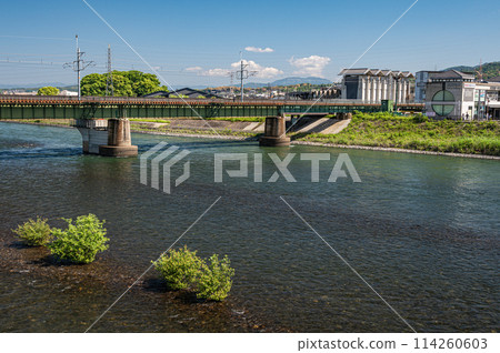Railway bridge of the JR Nara Line over the Uji River 114260603