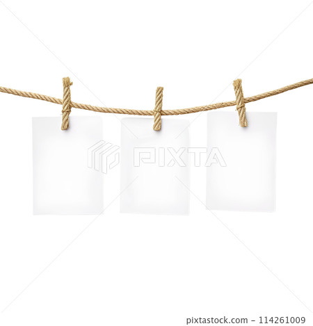 close up of a 3 blank note papers, photo frame on a rope with clothespins white background close up of a 3 blank note papers, photo frame on a rope with clothespins white background 114261009