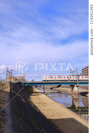 Hyogo Prefecture: View of downtown Sanda from the Mukogawa riverbed in Sanda City 114261263