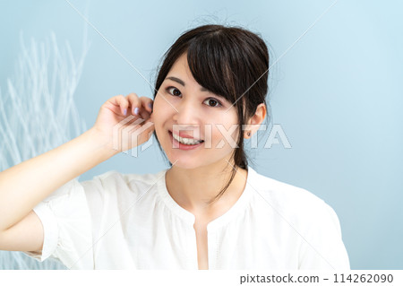 A woman relaxing at home A woman relaxing at home 114262090