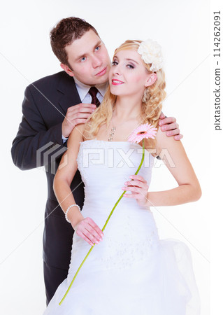 Happy groom and bride posing for marriage photo Happy groom and bride posing for marriage photo 114262091