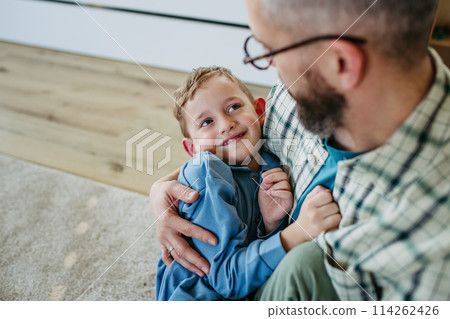 Dad hugging little son, true love. Happy Fathers day concept. 114262426