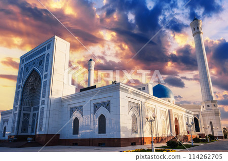 facade of modern white marble Islamic Masjid Minor Mosque in Tashkent in Uzbekistan on background of sunset sky in summer facade of modern white marble Islamic Masjid Minor Mosque in Tashkent in Uzbekistan on background of sunset sky in summer 114262705