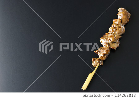 Yakitori and liver photographed against a black background 114262818