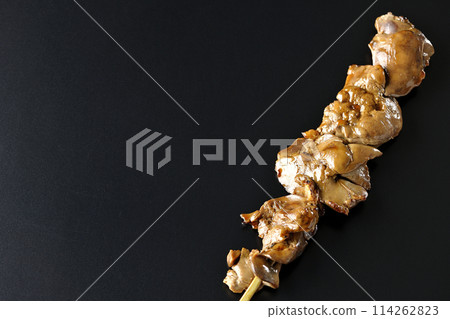 Yakitori and liver photographed against a black background 114262823