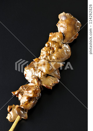 Yakitori and liver photographed against a black background 114262826