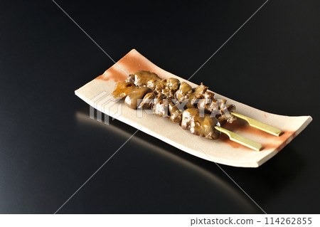 Yakitori and liver photographed against a black background Yakitori and liver photographed against a black background 114262855