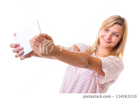 Woman taking self picture with tablet Woman taking self picture with tablet 114263150