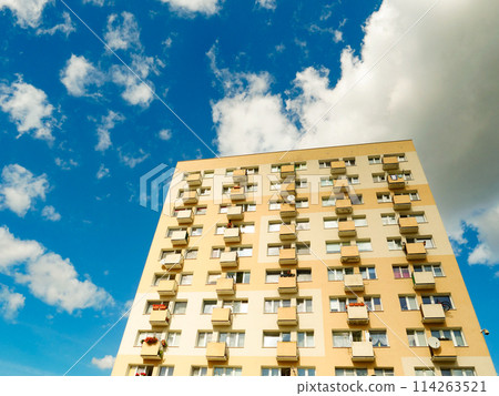 Multi-storey house against blue sky Multi-storey house against blue sky 114263521