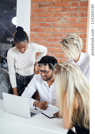 three attractive office workers flirting with their leader 114264190