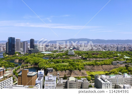 Golden Week, early May, young leaves, Osaka Castle Park in early summer, Osaka Castle with fresh greenery as seen from the lounge of a high-rise apartment Golden Week, early May, young leaves, Osaka Castle Park in early summer, Osaka Castle with fresh greenery as seen from the lounge of a high-rise apartment 114264591