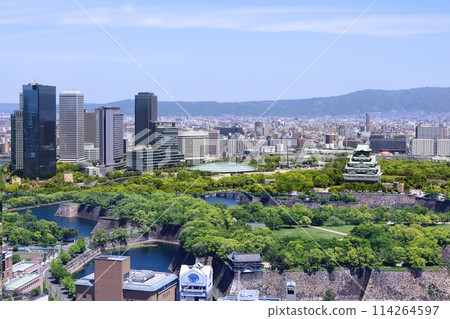 Golden Week, early May, young leaves, Osaka Castle Park in early summer, Osaka Castle with fresh greenery as seen from the lounge of a high-rise apartment 114264597