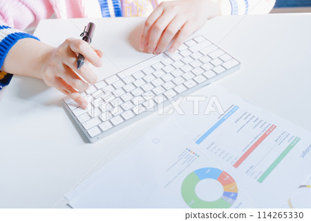 work and learn online in new normal concept from woman typing on wireless keyboard with business document and white isolated background work and learn online in new normal concept from woman typing on wireless keyboard with business document and white isolated background 114265330
