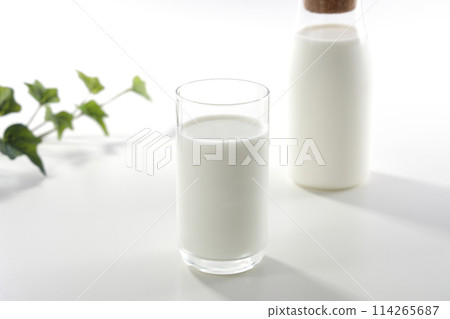 Milk on white background Milk on white background 114265687