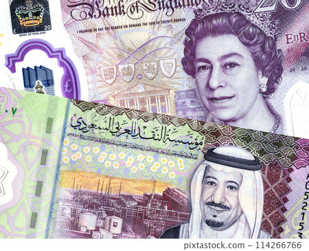 Saudi Arabia Riyal banknote with King Salman portrait and British pounds sterling banknote with Queen Elizabeth II 114266766