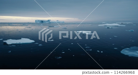 Winter sea landscape with floating ice fragments on still cold water. Generative AI 114266968